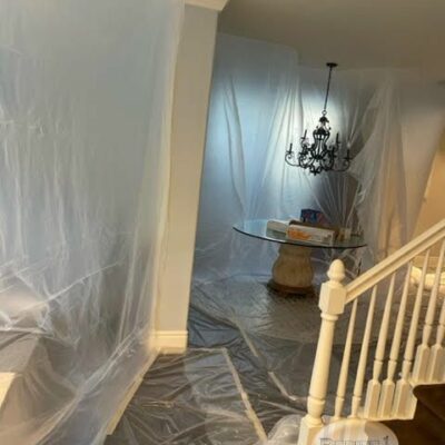 Hallway covered with plastic sheets, prepared for renovation work